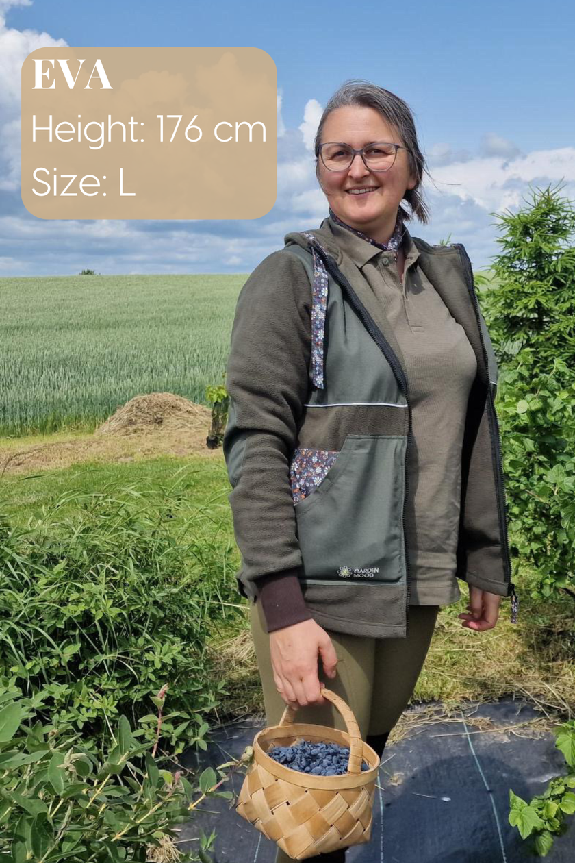 Garden Mood klientė Eva, 176 cm, vilki L dydžio sodo džemperį — laiko uogų krepšelį lauke