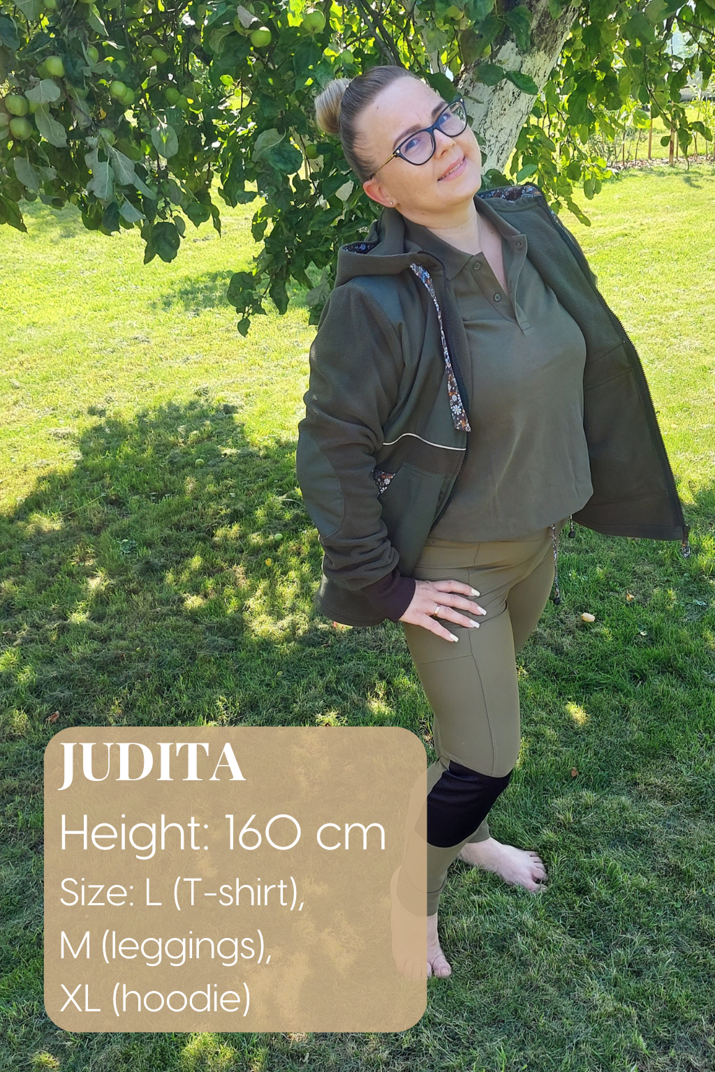 Garden Mood klientė, 160 cm, vilki XL dydžio sodo džemperį sode po obelimi